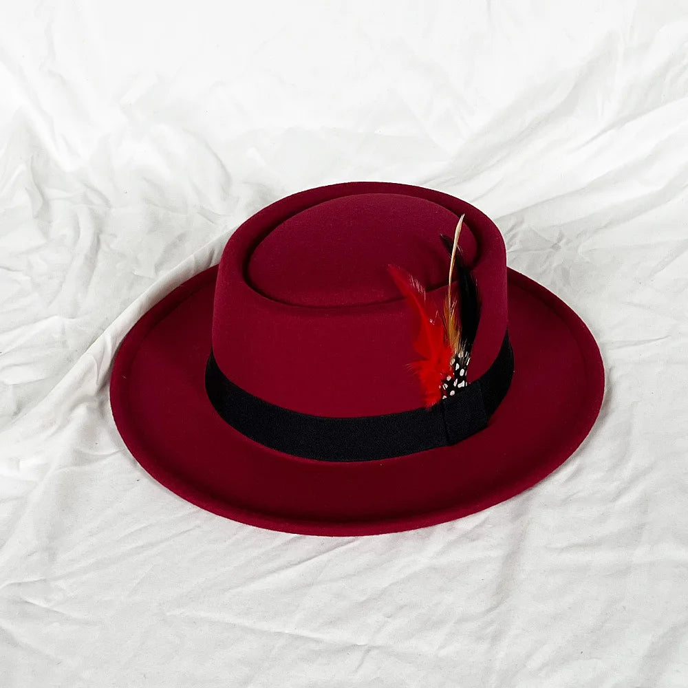 Close-up of the feather detail on the black Feather-Touched Fedora.