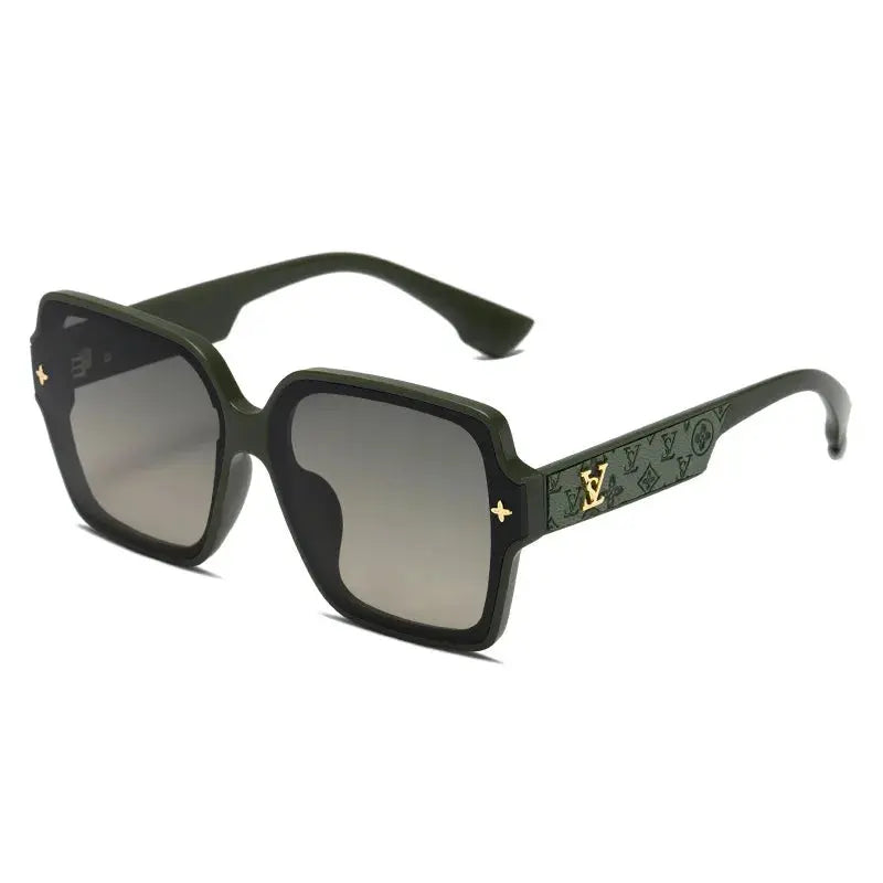 Trendy sunglasses displayed on a soft fabric, emphasizing their luxury appeal.