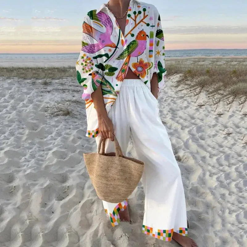 Relaxed fit two-piece set featuring a tranquil ocean-inspired print.