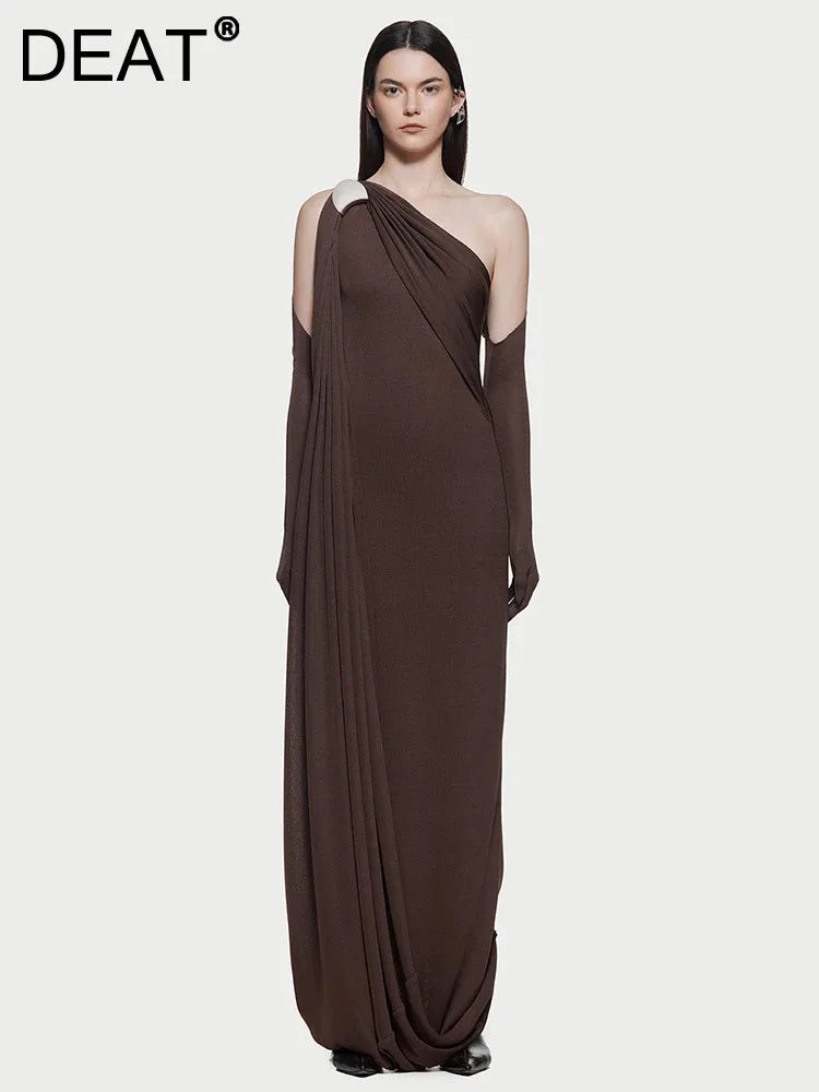 Asymmetrical evening dress with diagonal collar in sleek black fabric.