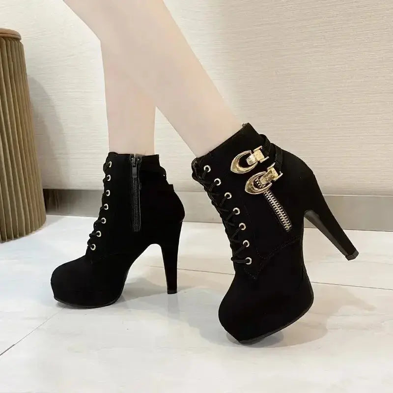 Black leather Nightfall Glamour Ankle Boots with stiletto heels and pointed toe.
