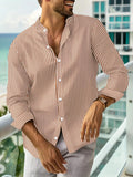 Men's sleek dress shirt featuring flexible fabric that moves with you, maintaining elegance.