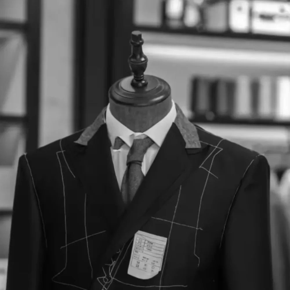 Tailored blazer from the seamless suit ensemble, featuring a modern cut and classic details in charcoal gray.