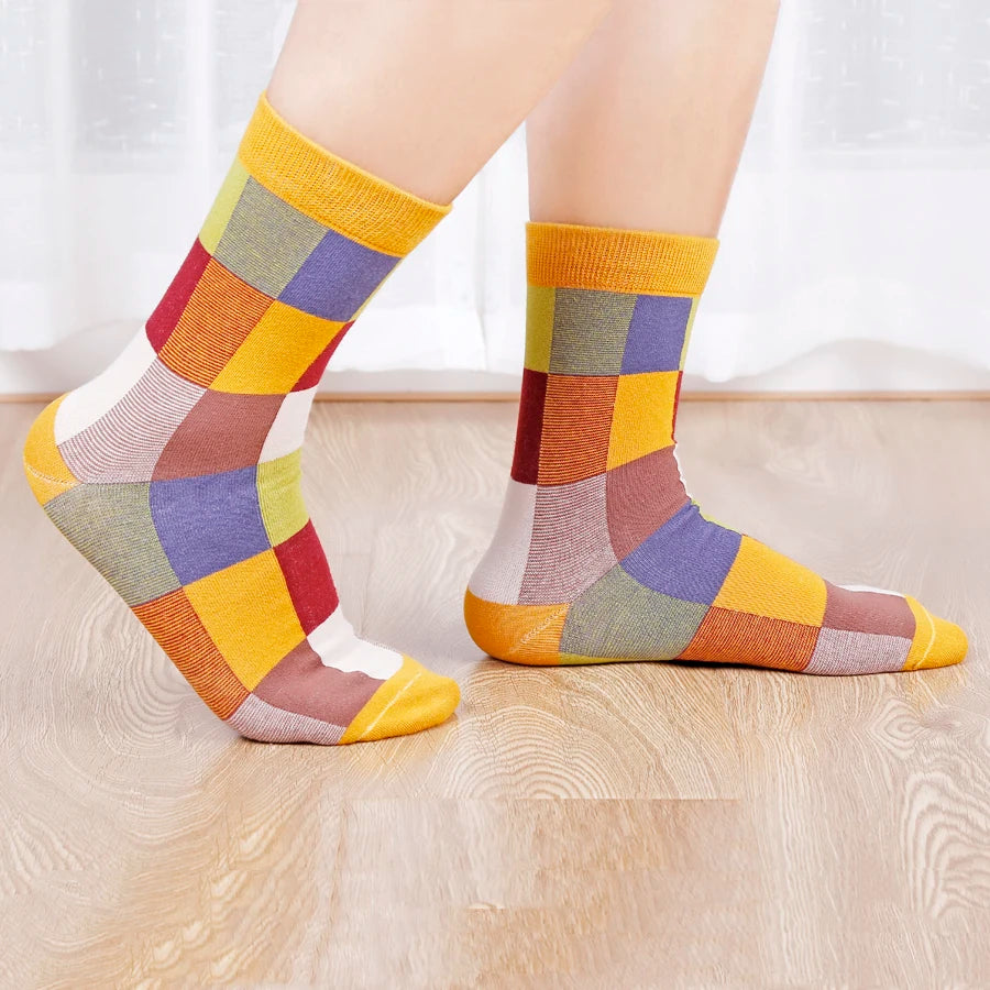 Colorful crew socks with non-fade patterns, maintaining brilliance after washes.