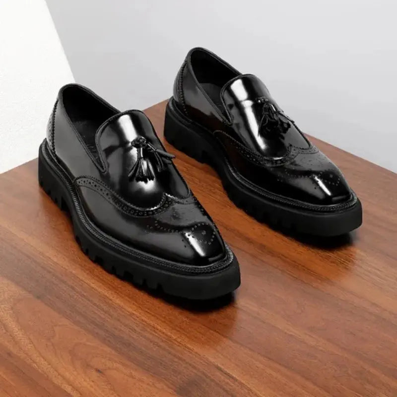 Durable rubber outsole of the waterproof tassel loafers.