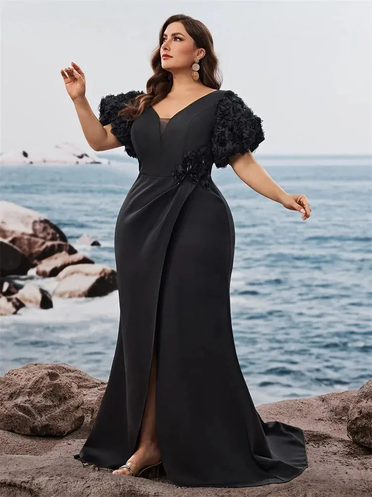 Side view of the Midnight Cascade dress, emphasizing the alluring side slit and flattering fit.