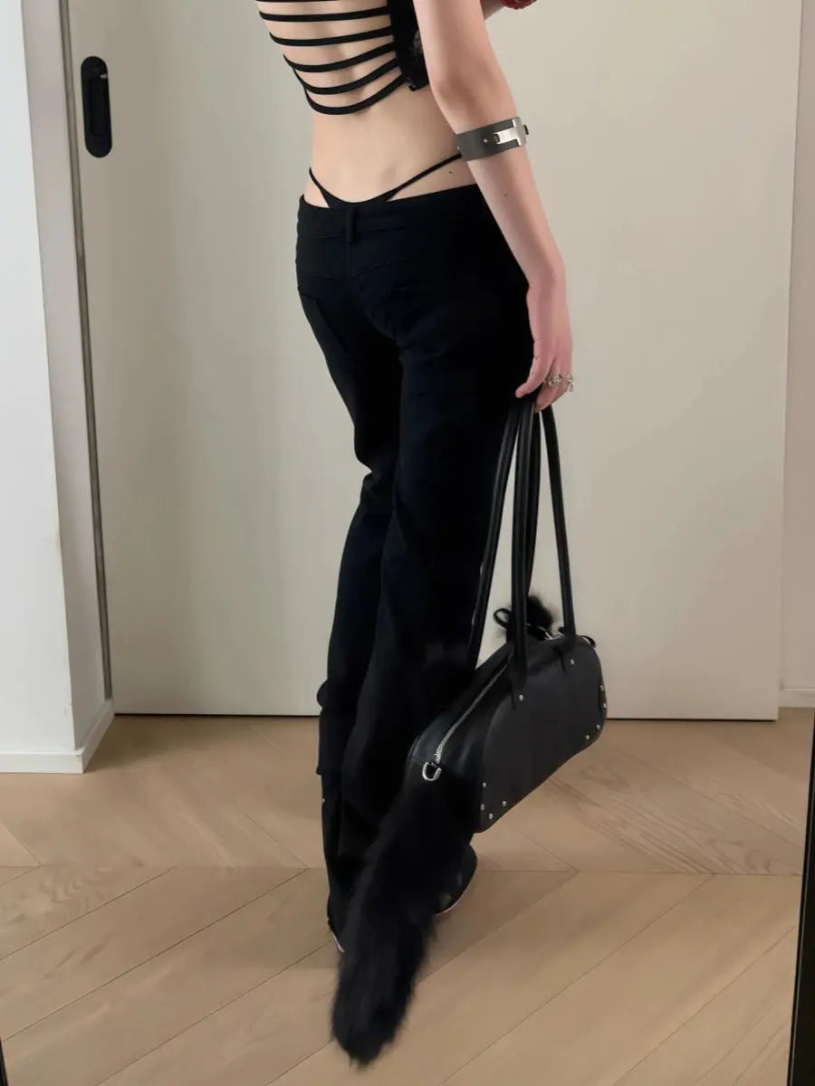 Y2K-inspired midnight blue stretch flared jeans featuring glamorous rivet accents and body-contouring fit