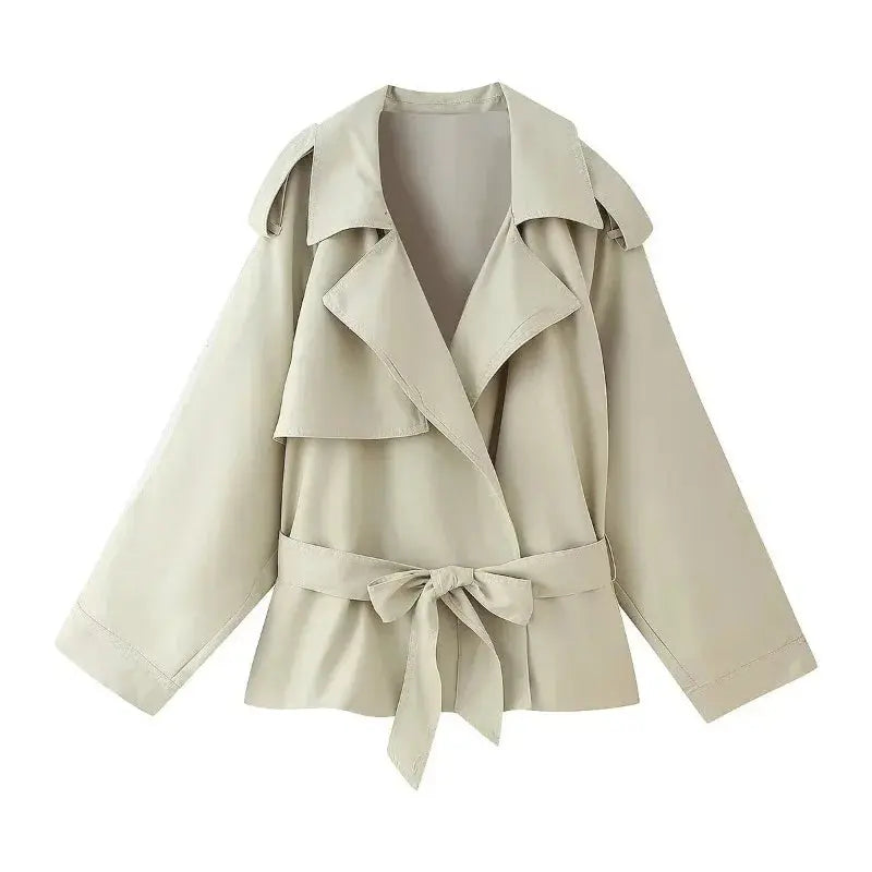 Stylish V-neck casual jacket draped over a model's shoulders, showcasing effortless chic.