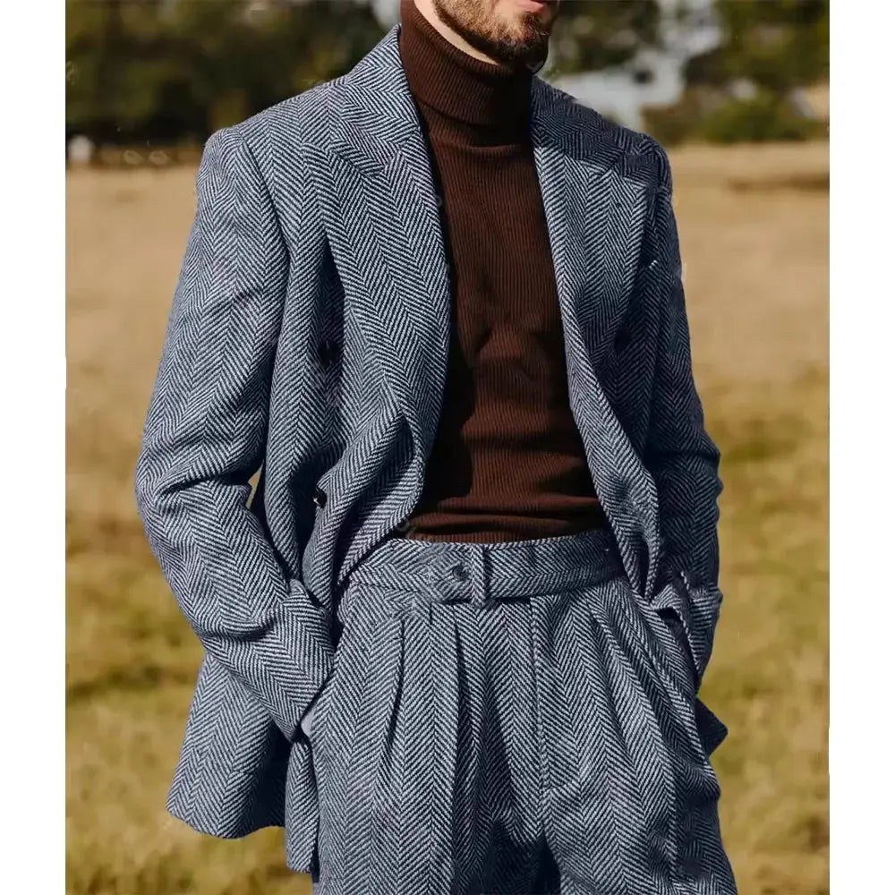 Back view of the tailored herringbone suit, showcasing its elegant design.