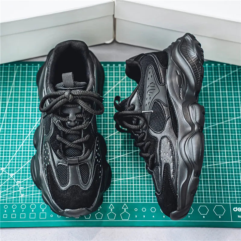 Pair of men's athletic sneakers with cushioned support and modern street-ready design