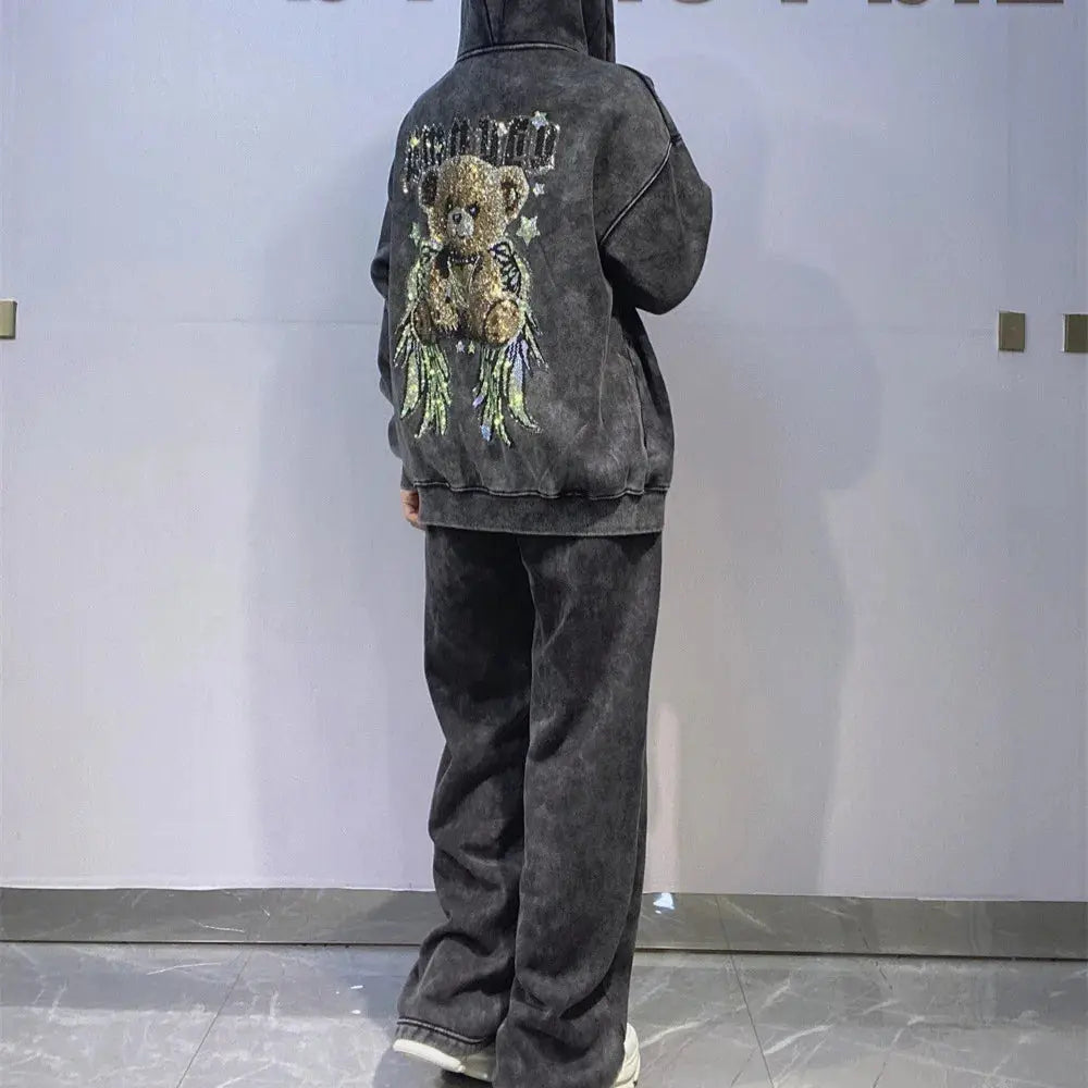 Full-length lounge pants with a drawstring and a matching hooded top in playful tie dye.