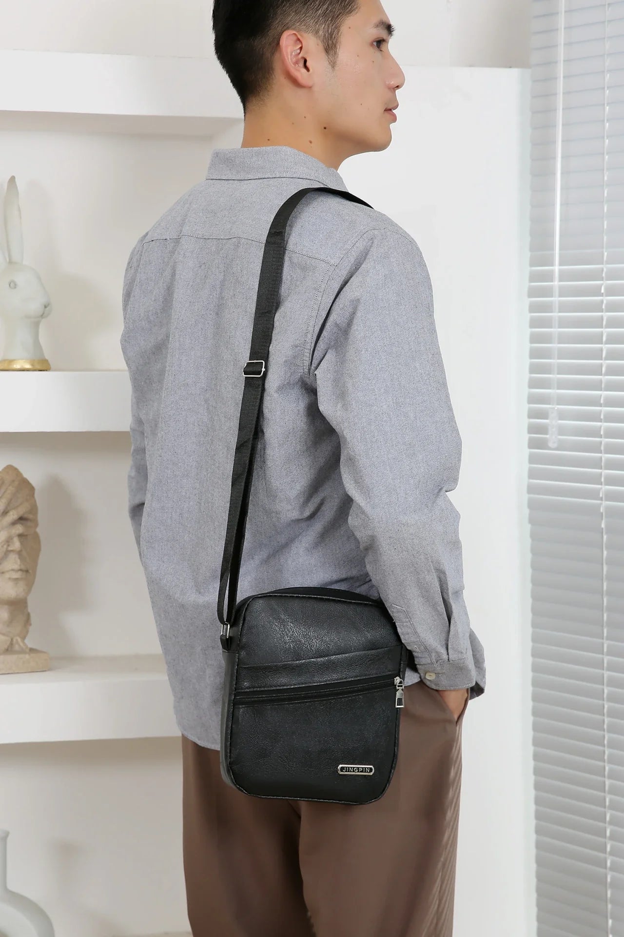 Functional crossbody bag with adjustable strap adapting to body movement and daily journeys