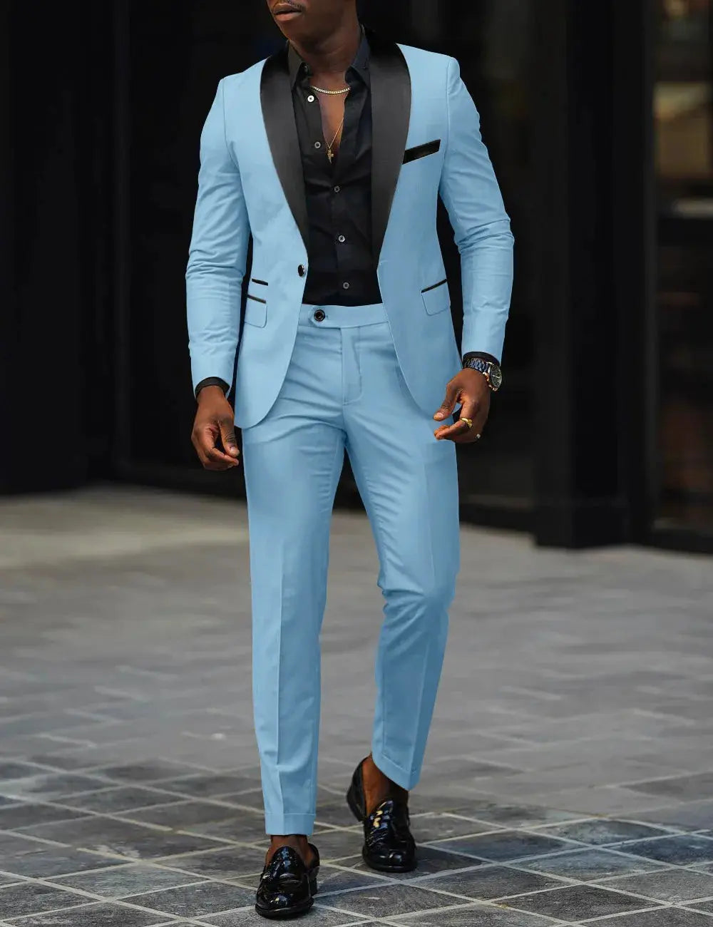 Back view of the sleek suit showcasing tailored silhouette.