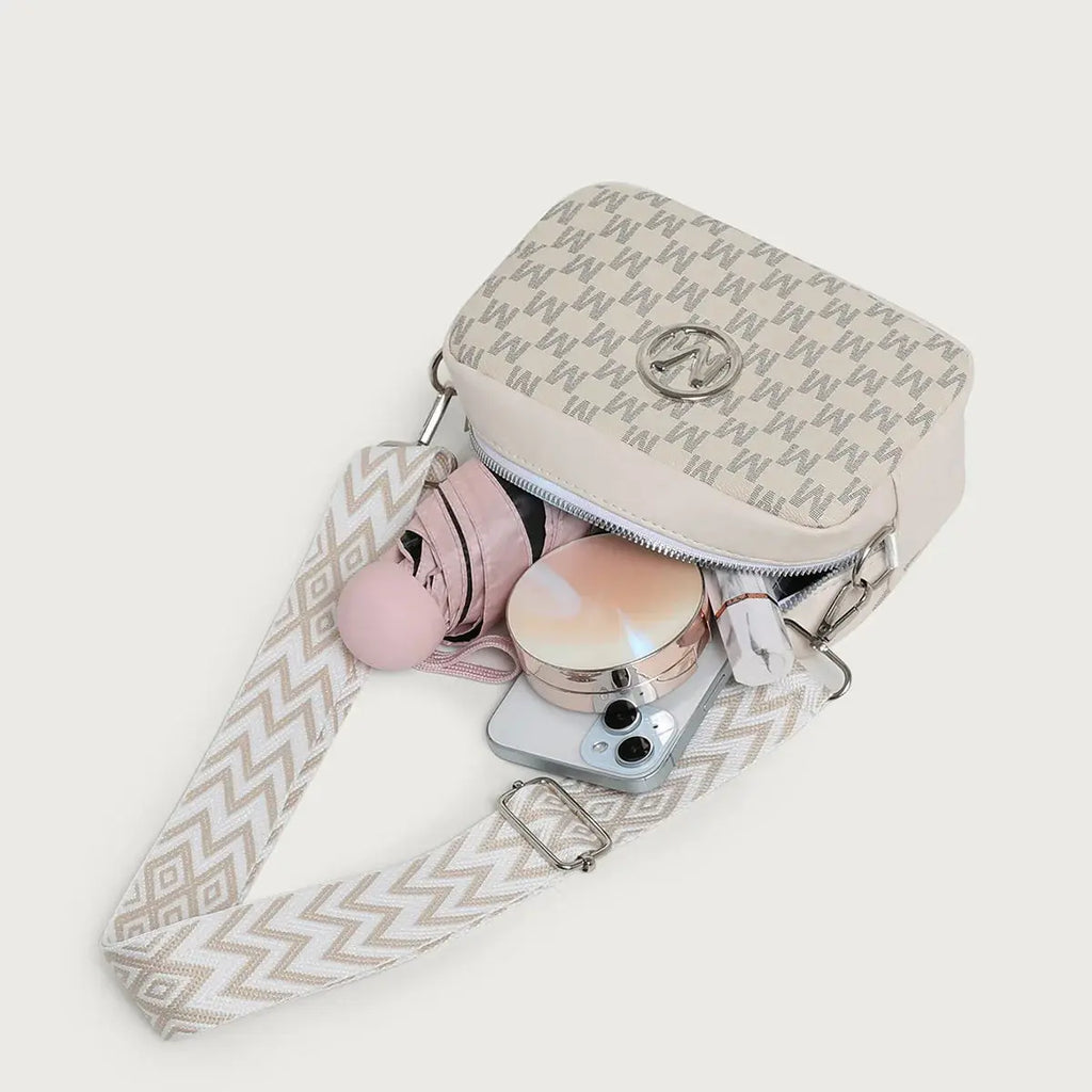 Trendy bag for women with a comfortable wide strap for shoulder or crossbody carry.