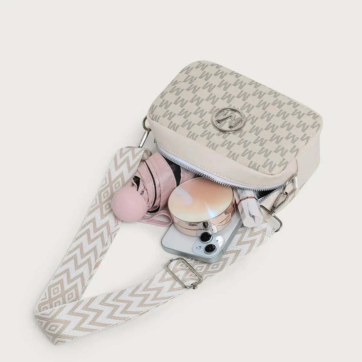 Trendy bag for women with a comfortable wide strap for shoulder or crossbody carry.