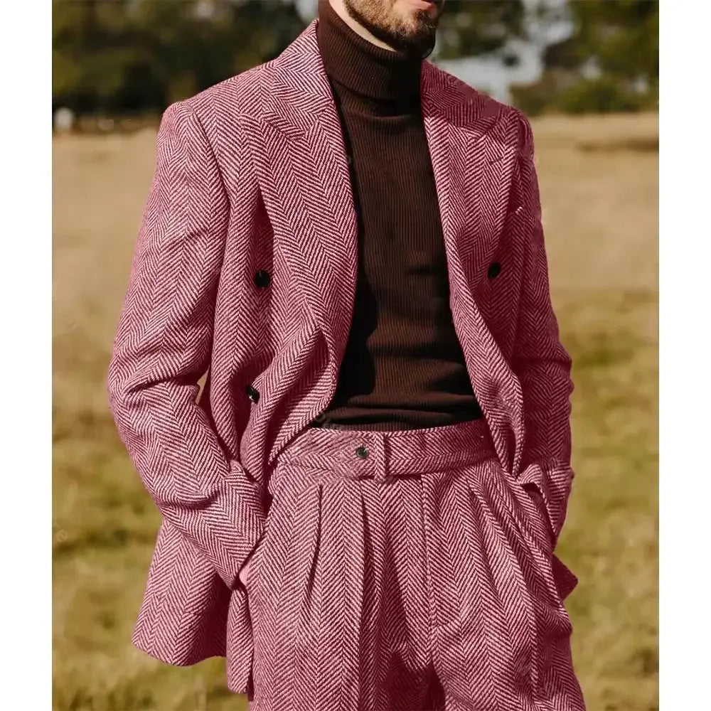 Elegant herringbone suit displayed on a mannequin, emphasizing tailored fit.