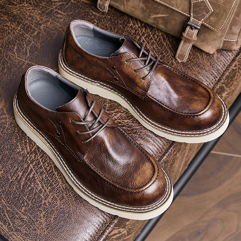 Versatile men's leather lace-up sneakers with waterproof technology and traditional British styling details