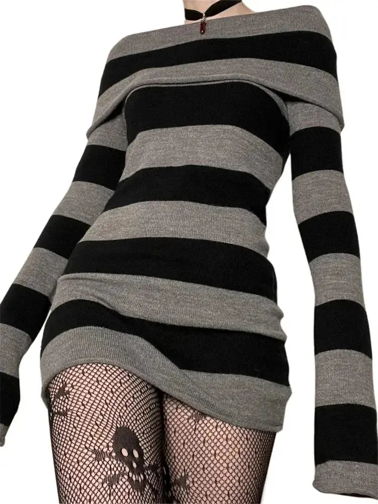 Midnight Confidence Striped Bodycon Dress in black and white stripes, showcasing a flattering silhouette.