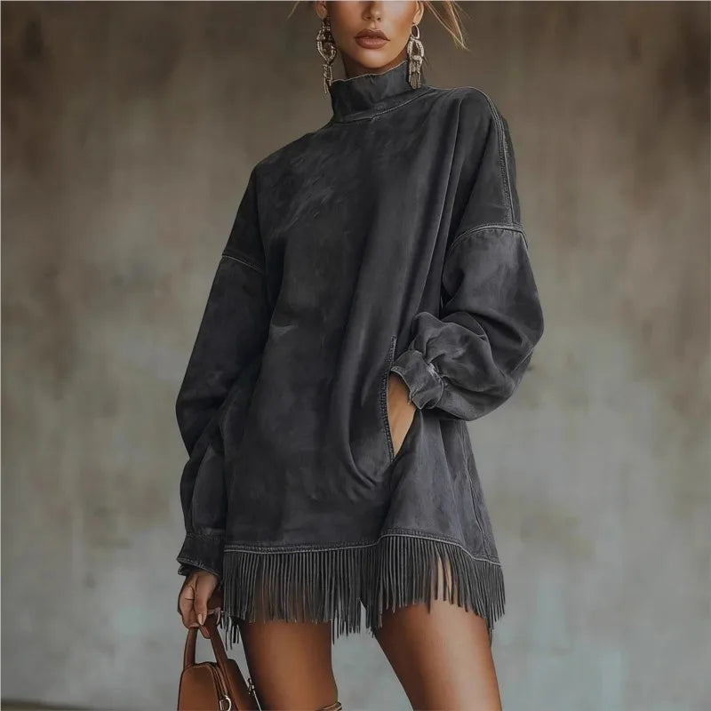 Detail shot of the enchanting tassels on the Autumn Whisper Turtleneck dress.