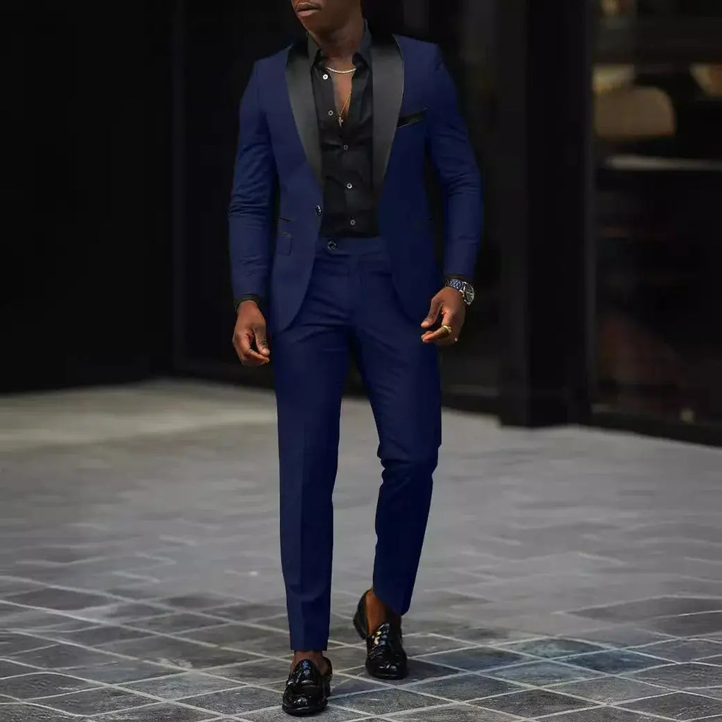 Single-button closure detail on a sophisticated men's suit.