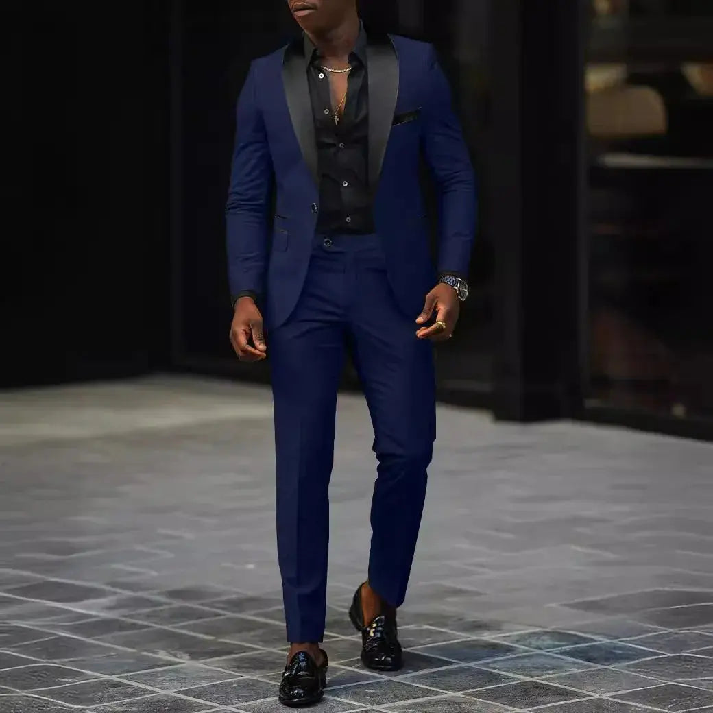 Single-button closure detail on a sophisticated men's suit.