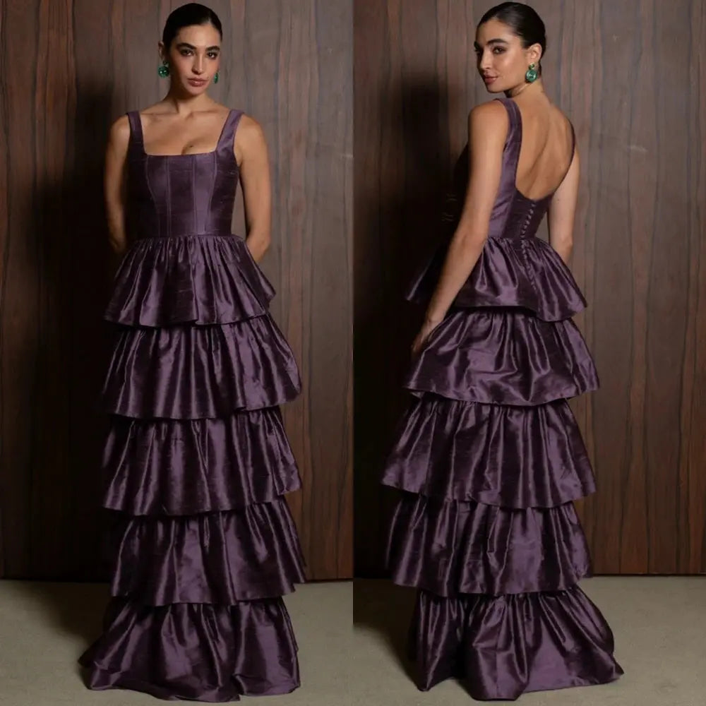 Elegant satin evening dress with a sweep train in a rich color, perfect for formal events.
