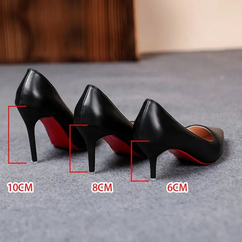 Chic black pointed heels with a sleek minimalist design for elegant occasions.