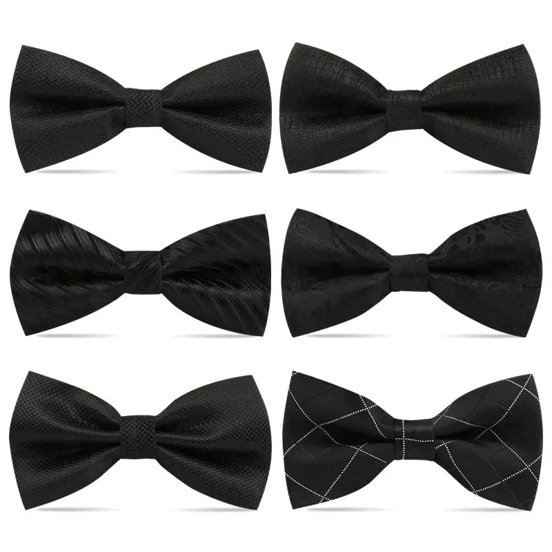 Close-up of the black bow tie showcasing its refined contours and elegant design.