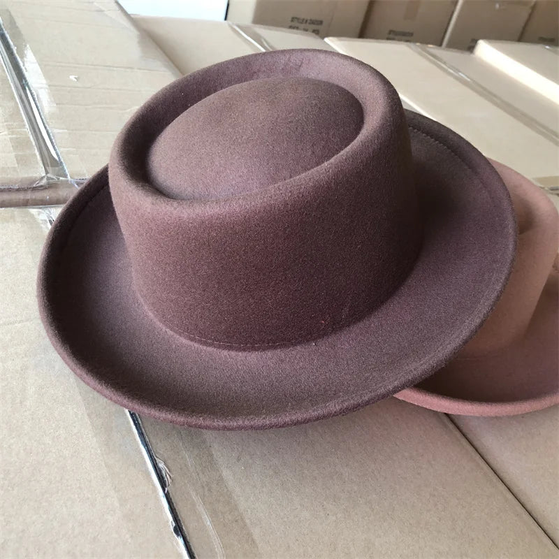 Sleek tan fedora, a stylish addition to any outfit.