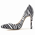 Zebra Elegance Heels paired with professional attire for a boardroom look.