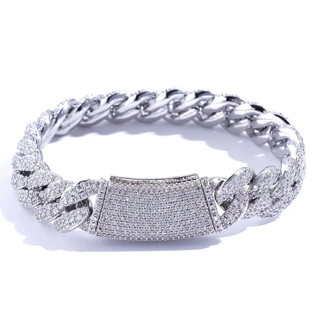 Flat lay of iced Miami Cuban chain showing full length, hand-set stones, and premium electroplated finish