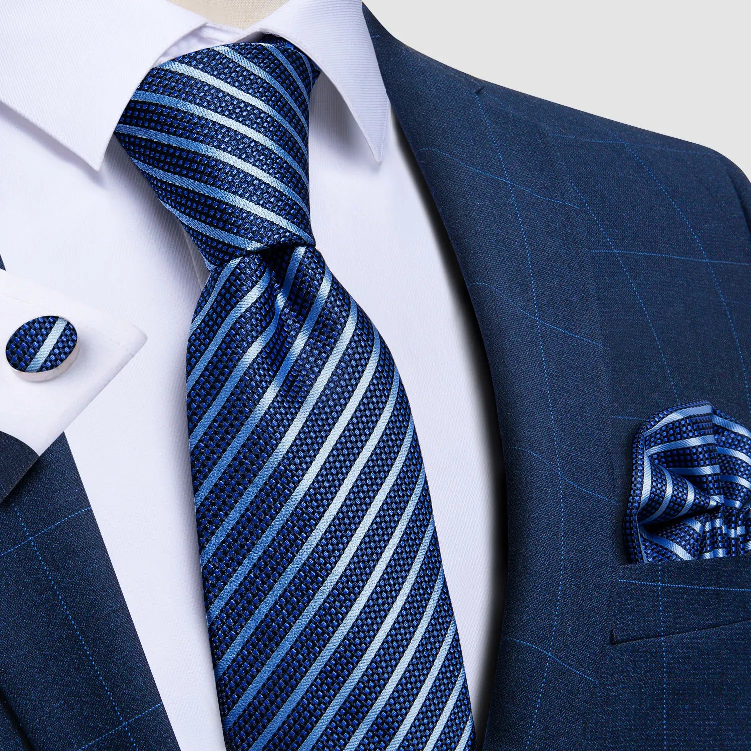 Refined paisley tie displaying lustrous sheen and matching pocket square