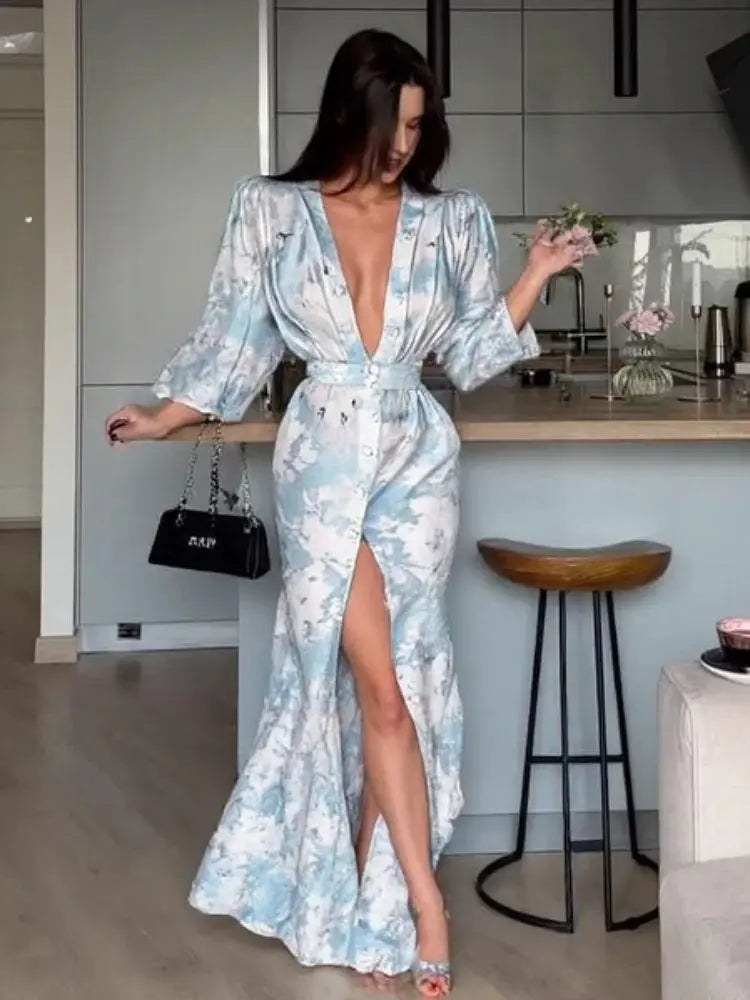 Midnight Whisper Dress in bold print with deep V-neck and high split, perfect for evening events.