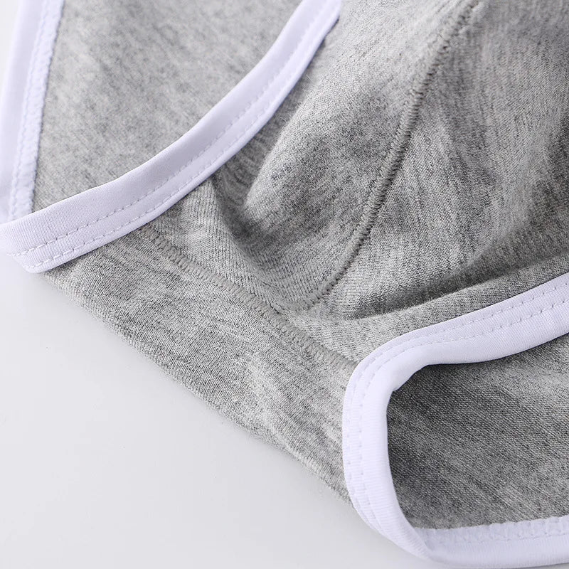 Low-rise Sculpted Comfort Briefs in navy, enhancing natural shape and silhouette.