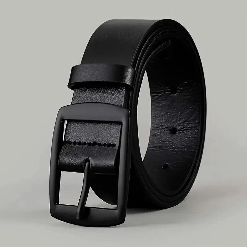 Close-up of the durable metal pin buckle on the unisex leather belt.
