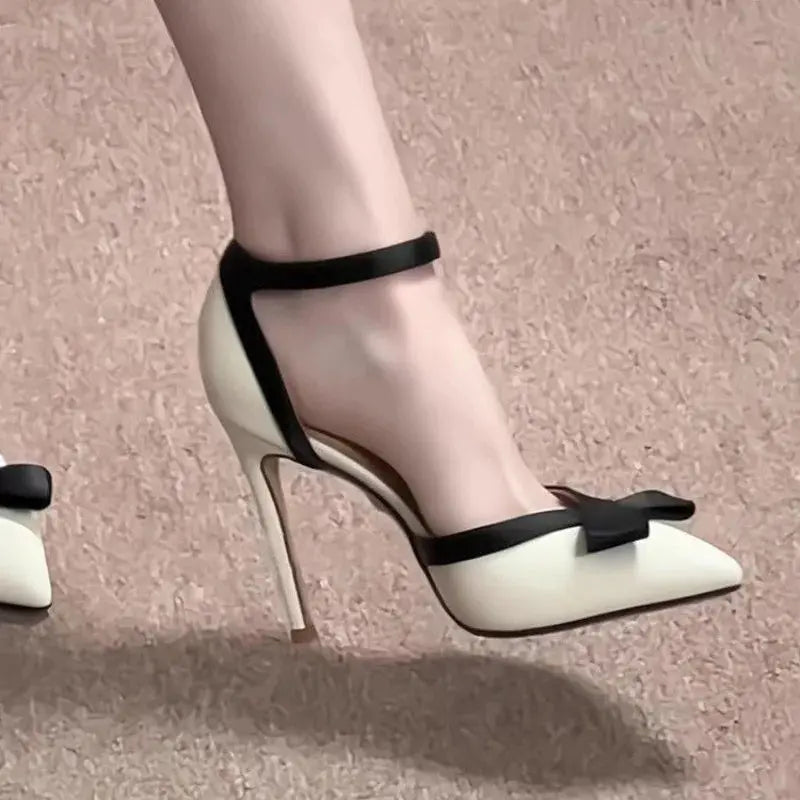 Midnight Rendezvous Stiletto Heels in luxurious black suede with pointed toe design.