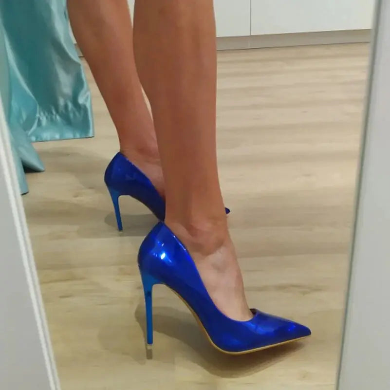 Elegant green high heels showcasing a towering heel for added height.