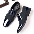 Black Oxford shoes with a polished finish, ideal for discerning gentlemen.