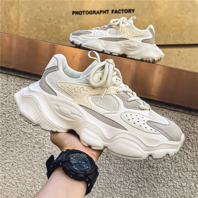 Men's athletic sneakers with cushioned insole and ventilated upper in neutral gray colorway