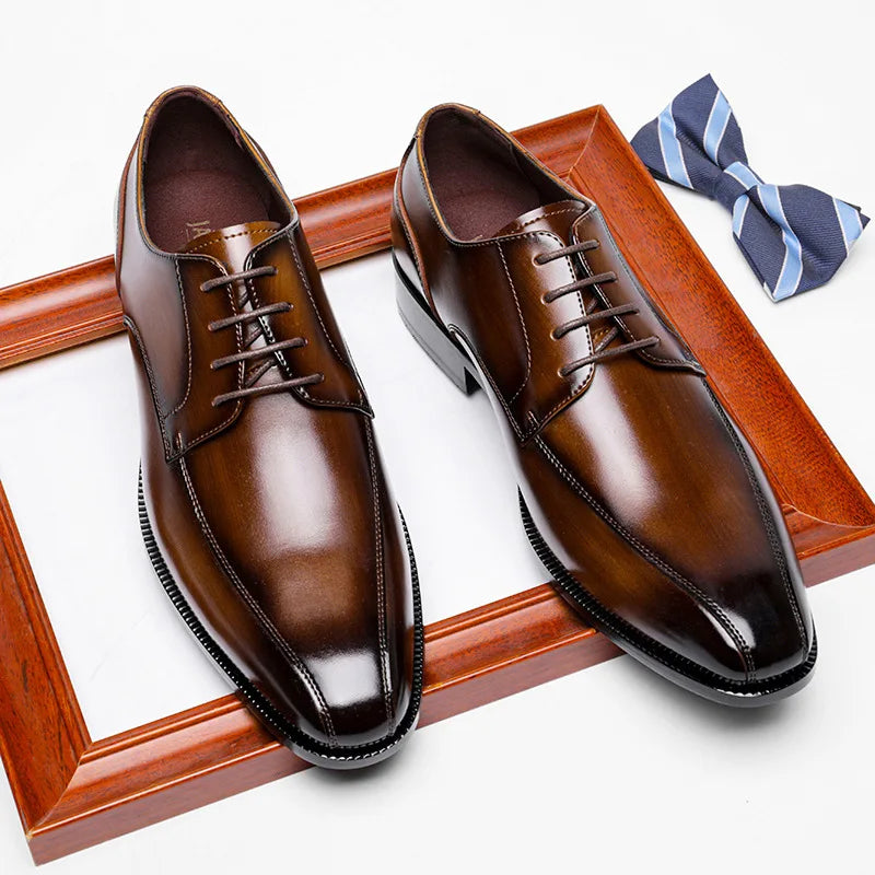 Refined leather dress shoes in black with elegant brogue detailing.