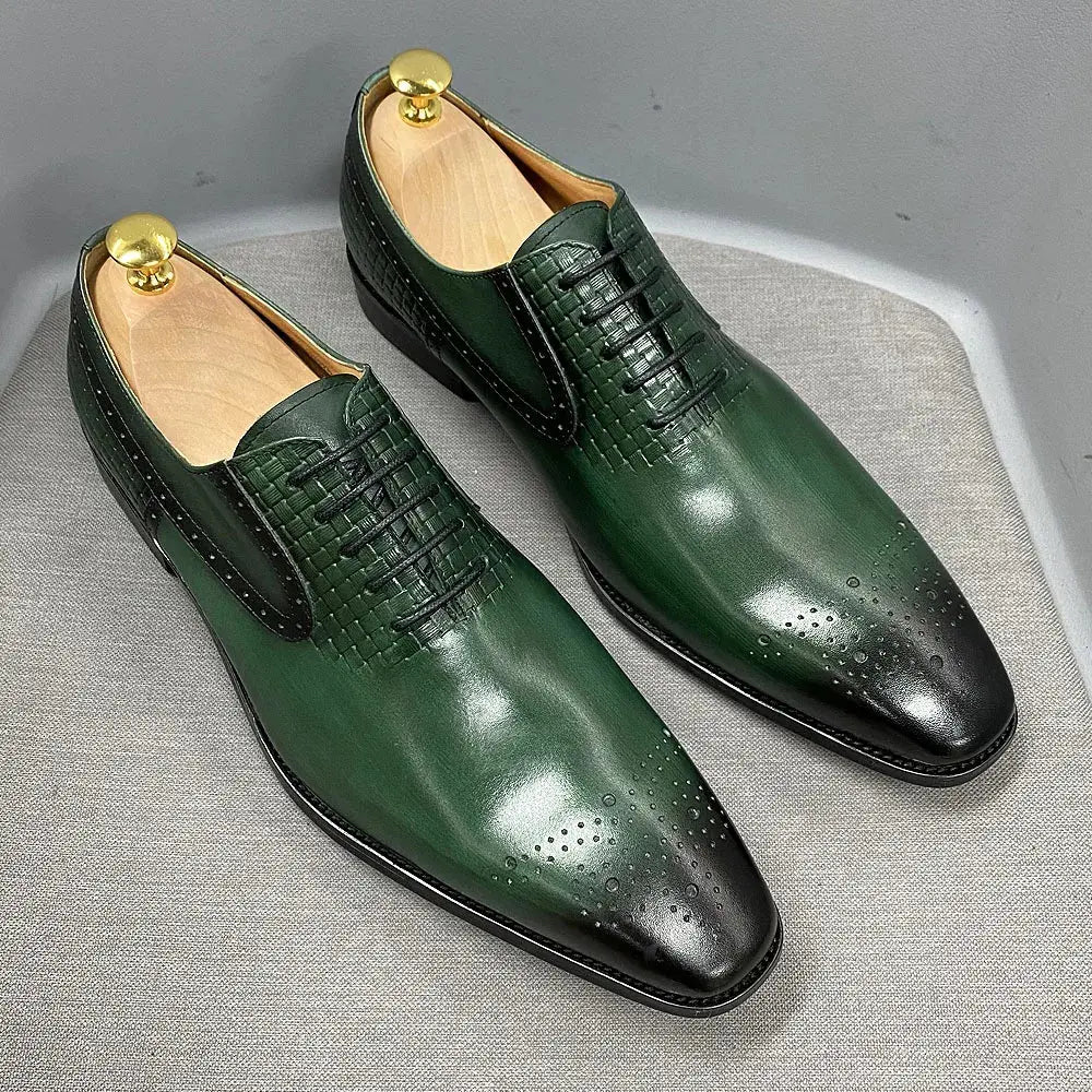 Handcrafted green leather Oxford shoes with brogue detailing.