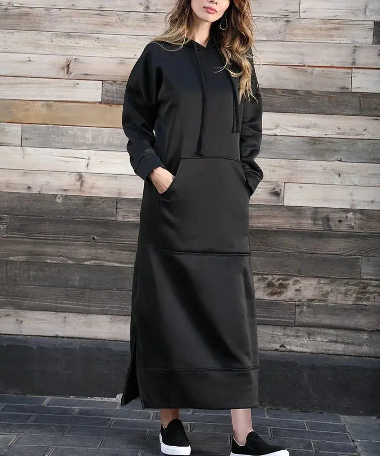 Serene fashion: loose-fit hooded Kaftan crafted for comfort and modesty.