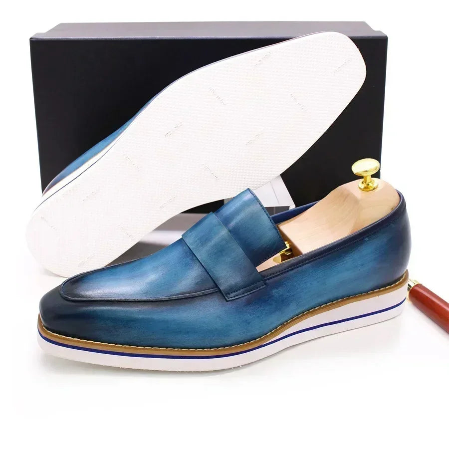 Handcrafted genuine leather loafers featuring effortless slip-on style and all-season versatility
