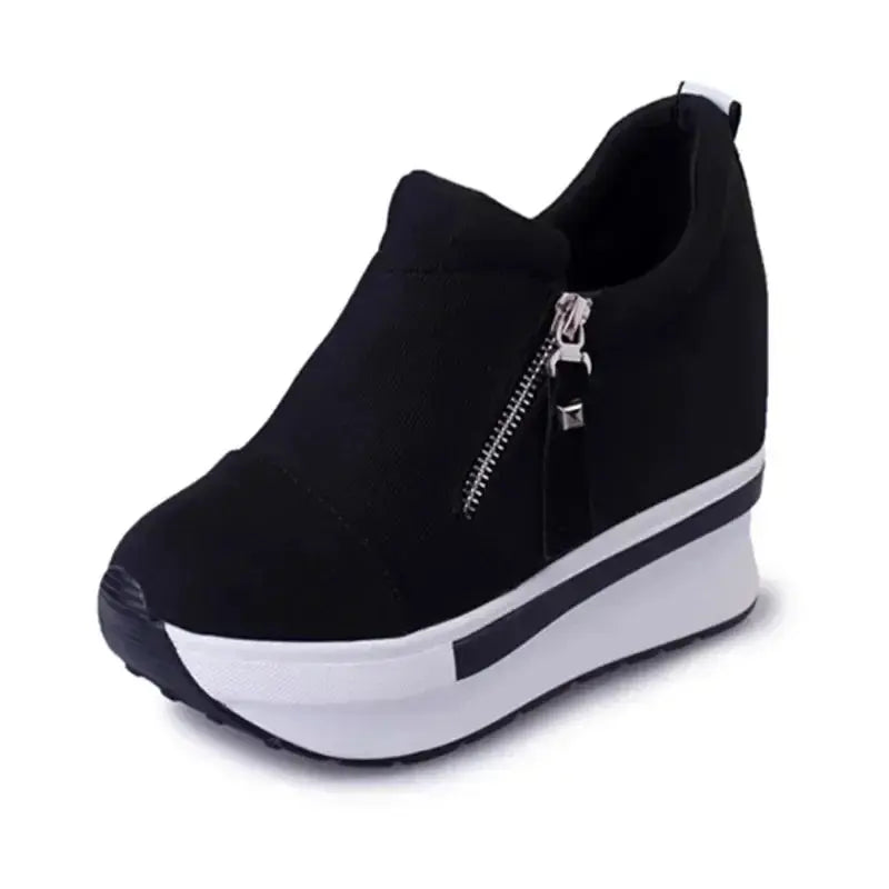 Red canvas wedge sneakers with invisible wedge for subtle elevation.