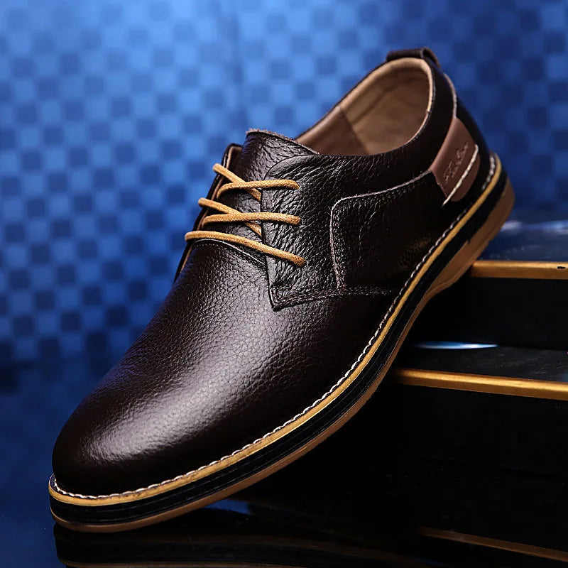 Oxfords displayed with a suit, perfect for business meetings.