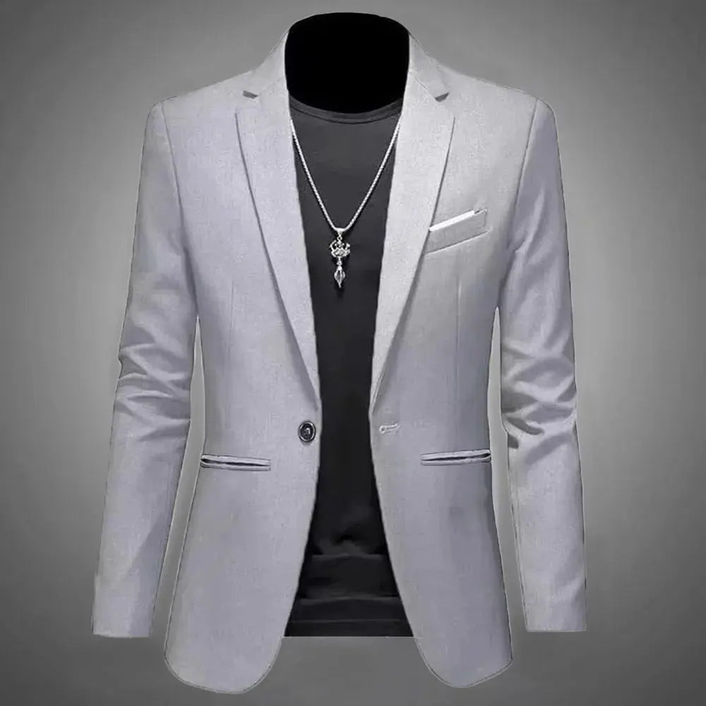 Men's black polyester blazer with slim fit design for a sharp, modern look.