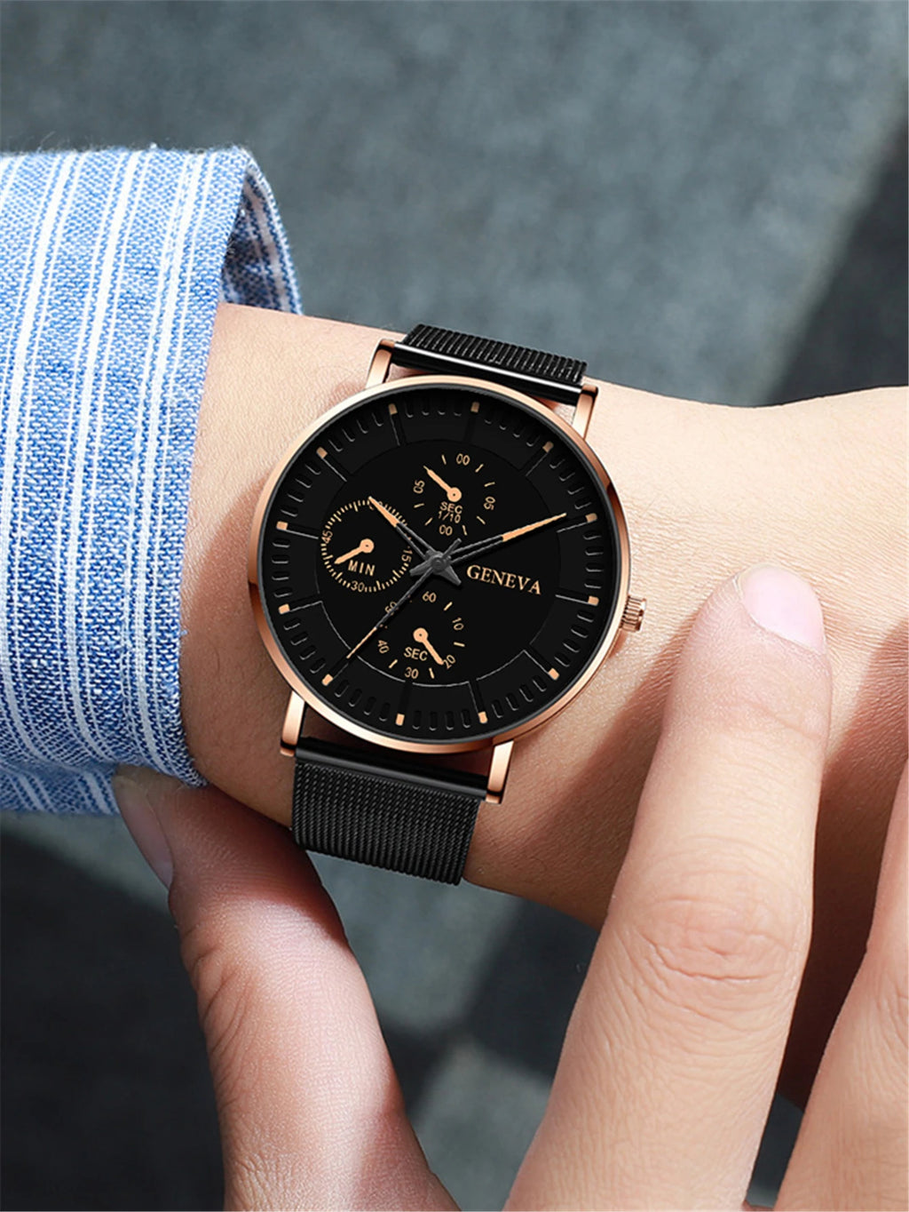 Sleek steel mesh band watch with a minimalist numberless face for elegant timekeeping.