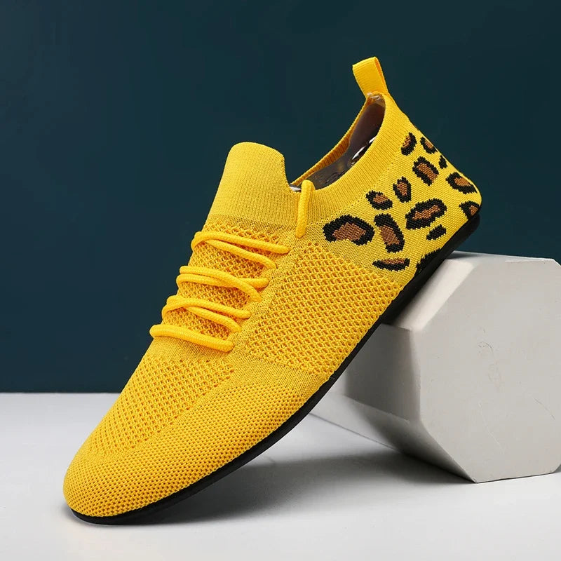 Top-down view of Whisper-Soft Steps sneakers, featuring breathable mesh and ultra-light construction.