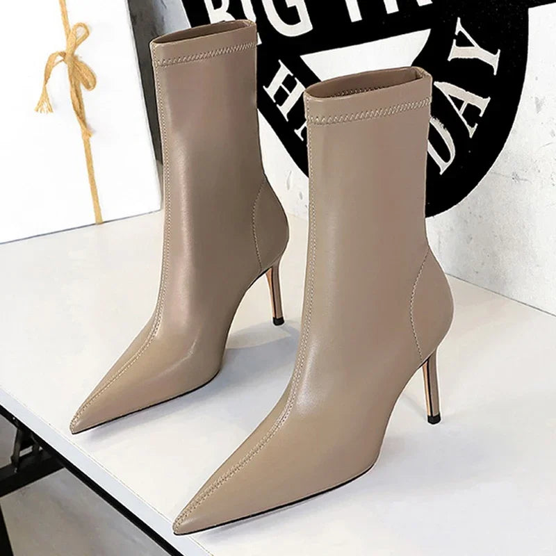 Premium leather mid-calf boots with thin stiletto heel and pointed toe