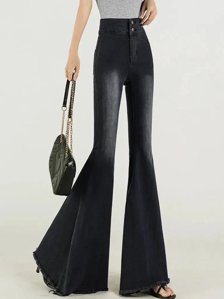 Flat lay of Midnight Whisper Jeans, emphasizing quality denim and essential wardrobe staple.